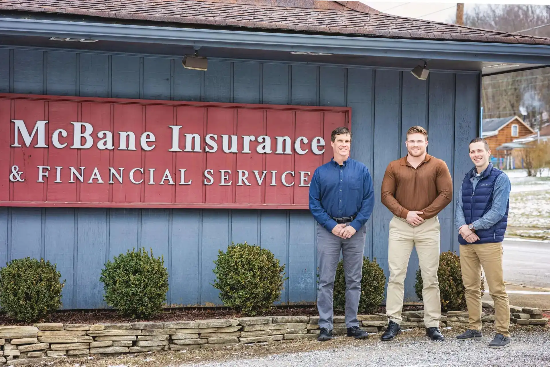 The McBane family in front of the original McBane Insurance office in Bergholz, Ohio